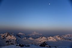 12A Moon And Sunrise On Mounts Shdavleri And Azau From Garabashi On Mount Elbrus Climb